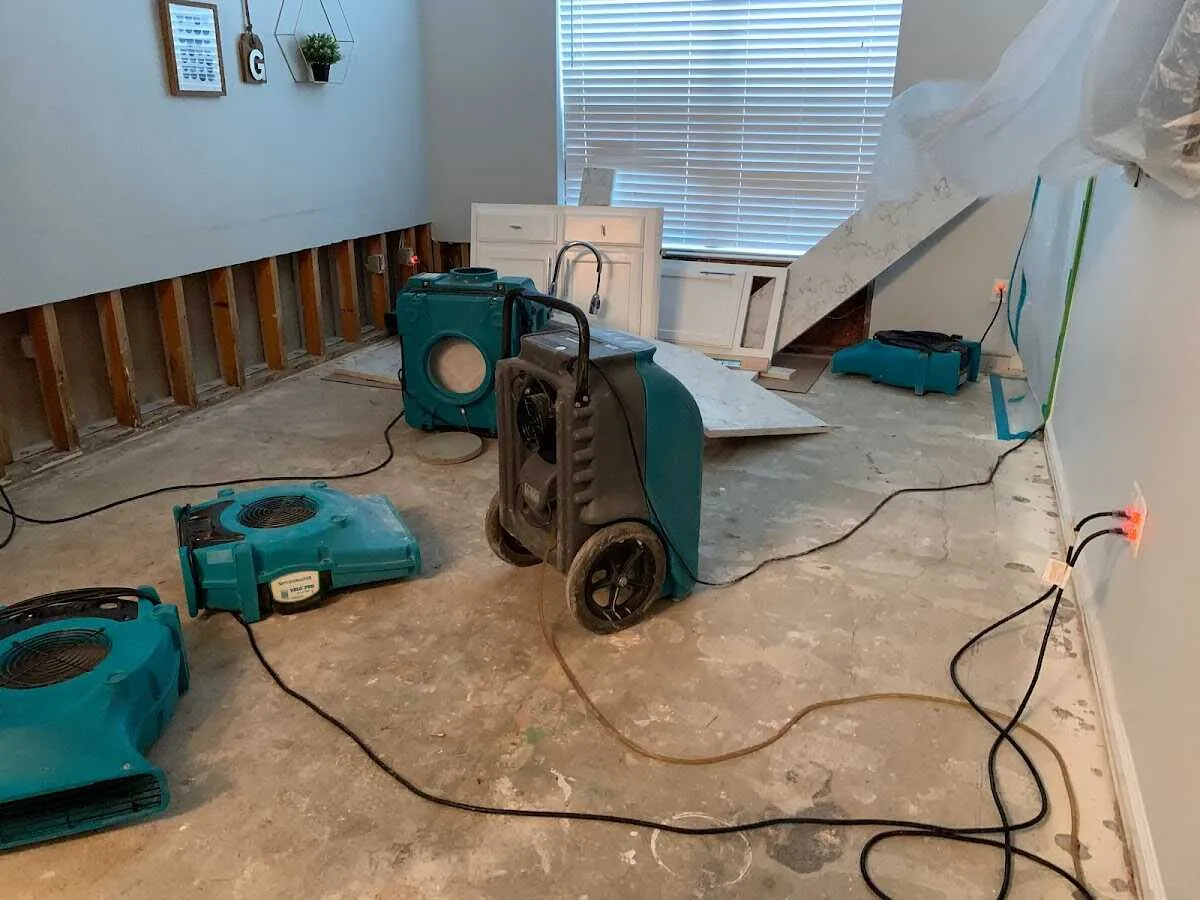 Dehumidifier in flood-cut room for Water Damage Restoration in Bristol